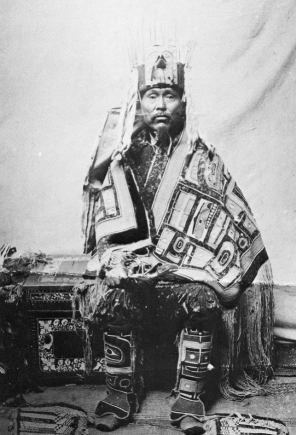 Tlingit man wearing Chilkat robe and leggings. Southeast Alaska. Courtesy of the Library, American Museum of Natural History, Jessup Collection, 411184.